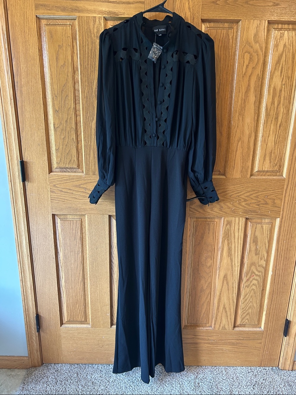 The The Sang  Black Long-Sleeve Jumpsuit with Scallop Trim